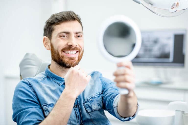 Man receiving comprehensive gum disease treatment at dental office in Colorado Springs, CO